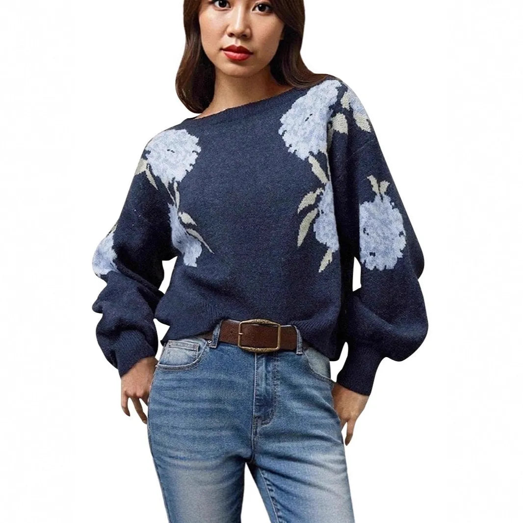 Sapphire blue women's loose pullover with woven floral jacquard pattern and off-neck design.