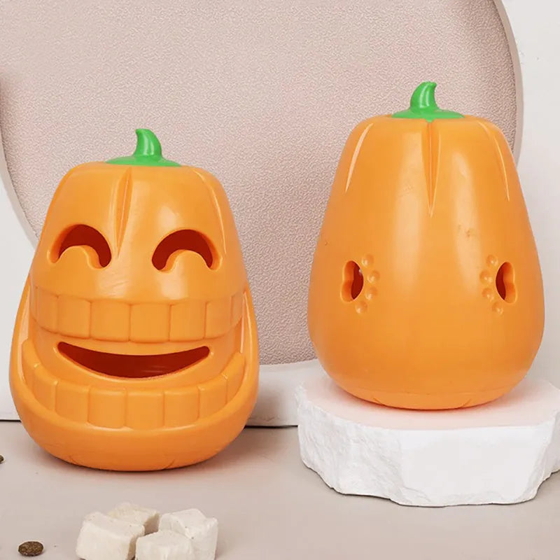 Orange Halloween pumpkin shaped dog chew toy with treat dispensing funnel