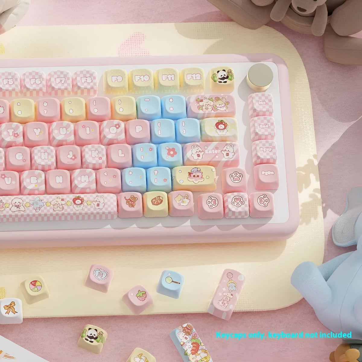 Doll-themed mechanical keyboard keycap set with sublimation printed designs in boxed packaging