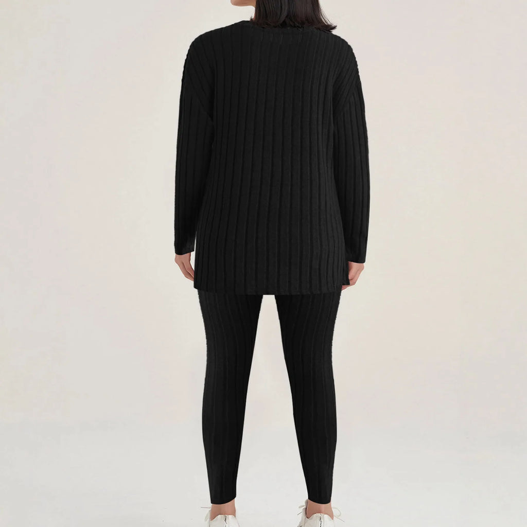 Black sunken stripe two-piece homewear set with pants and regular sleeve top on hanger