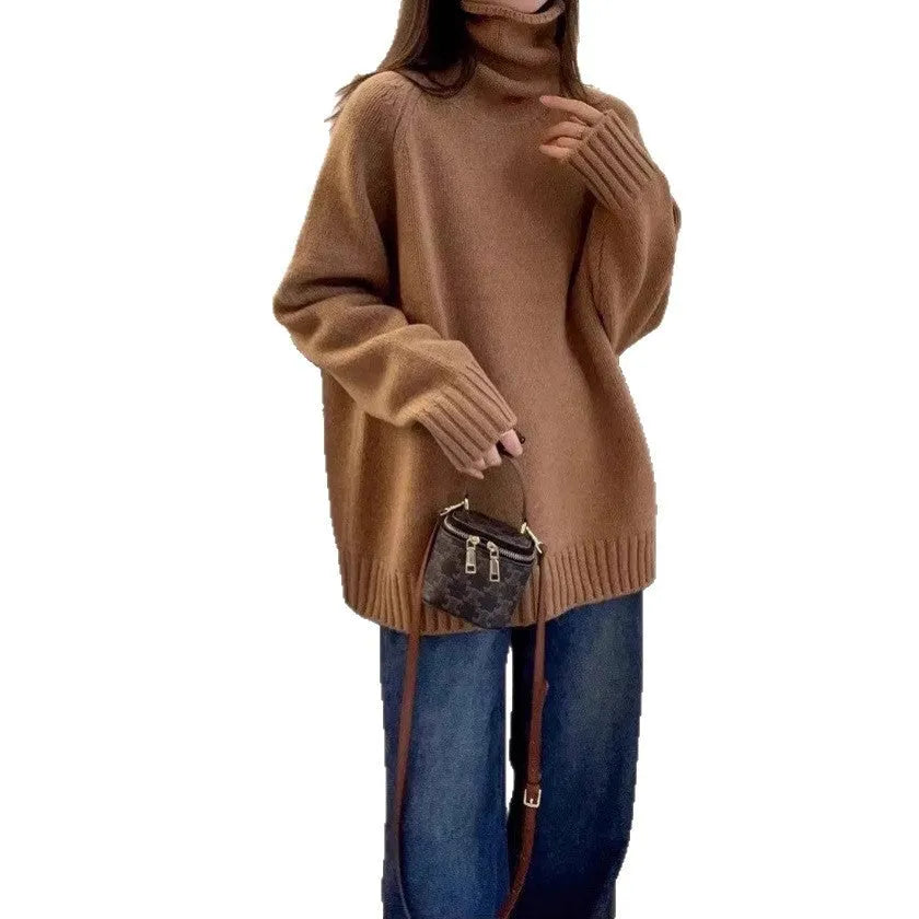 Red women's loose fit turtleneck sweater with a thick knit and curly pile collar on a hanger.