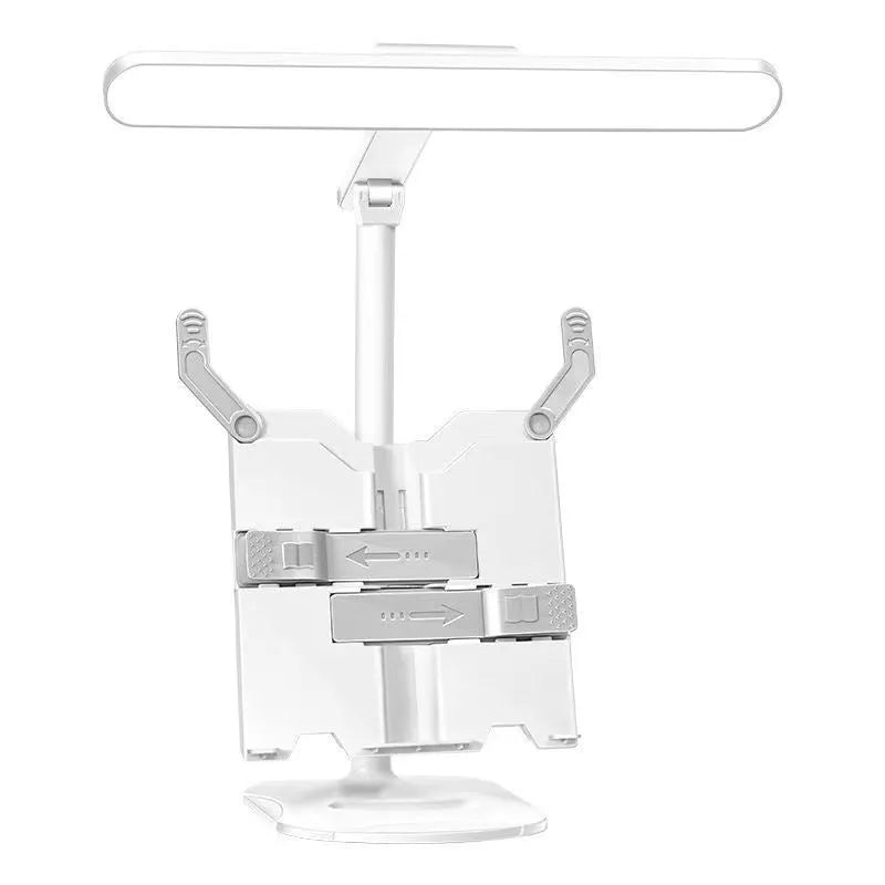 Adjustable reading bookshelf lamp with three colour temperature settings on a desk