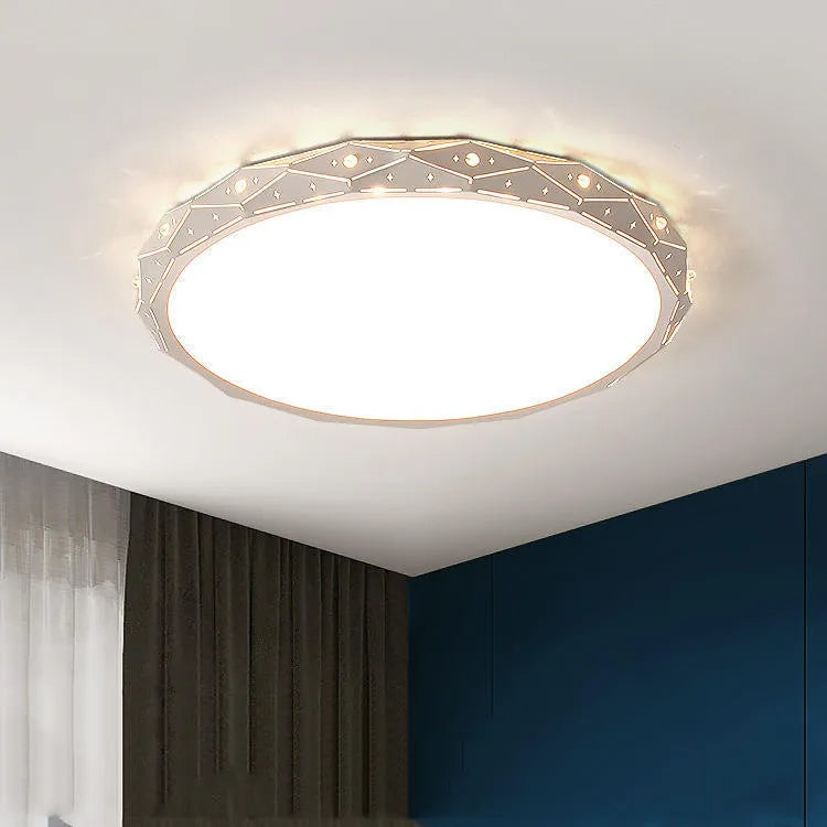 Round iron LED ceiling lamp with a black frame and dimmable light, mounted on a white ceiling.