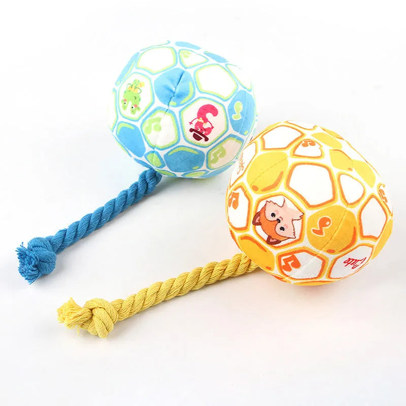 Blue and yellow dog football tug toy with cotton rope ball and cartoon face design