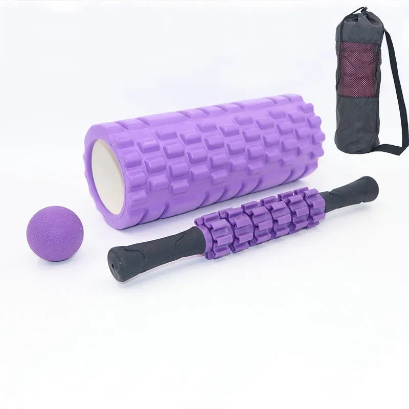 Black foam massage roller measuring 33cm with six separate massage pieces along shaft