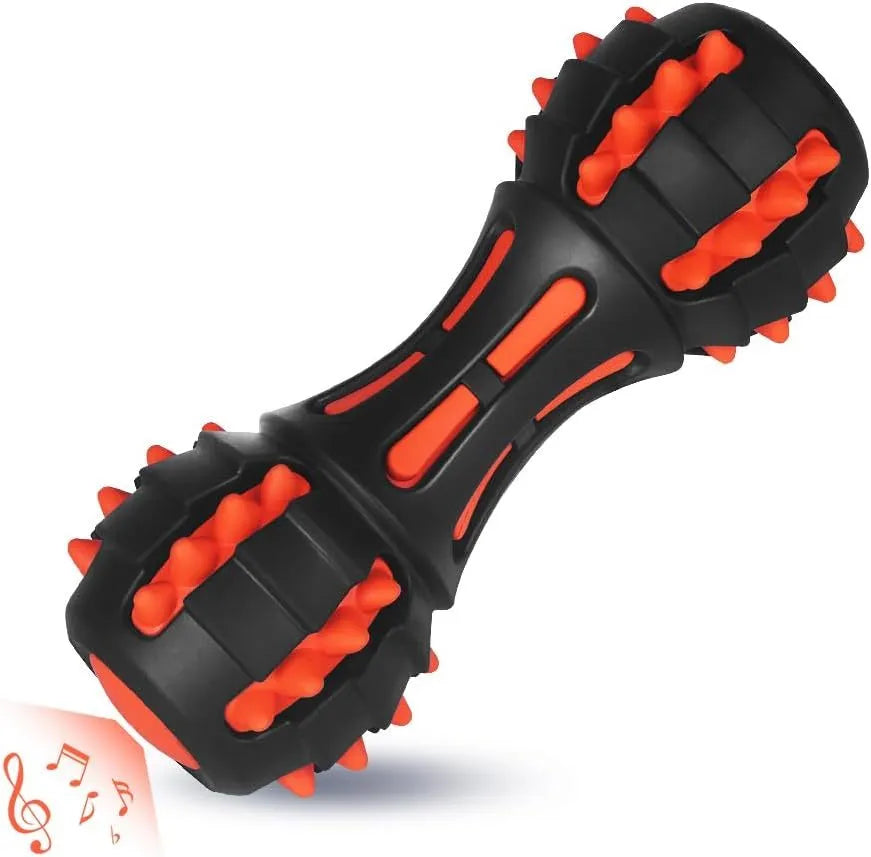 Red rubber dumbbell-shaped dog chew toy with squeaker for medium and large breed aggressive chewers.