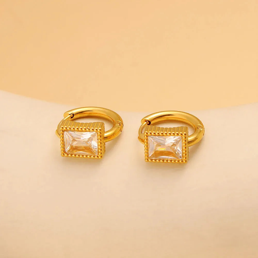 Square geometric zircon earrings with round ring details on stainless steel.