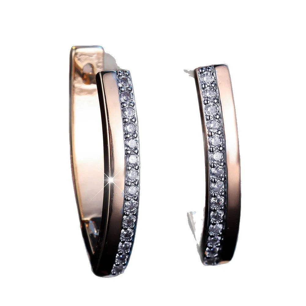 Women's V-shaped geometric earrings in champagne gold white diamond colour with electroplated copper construction