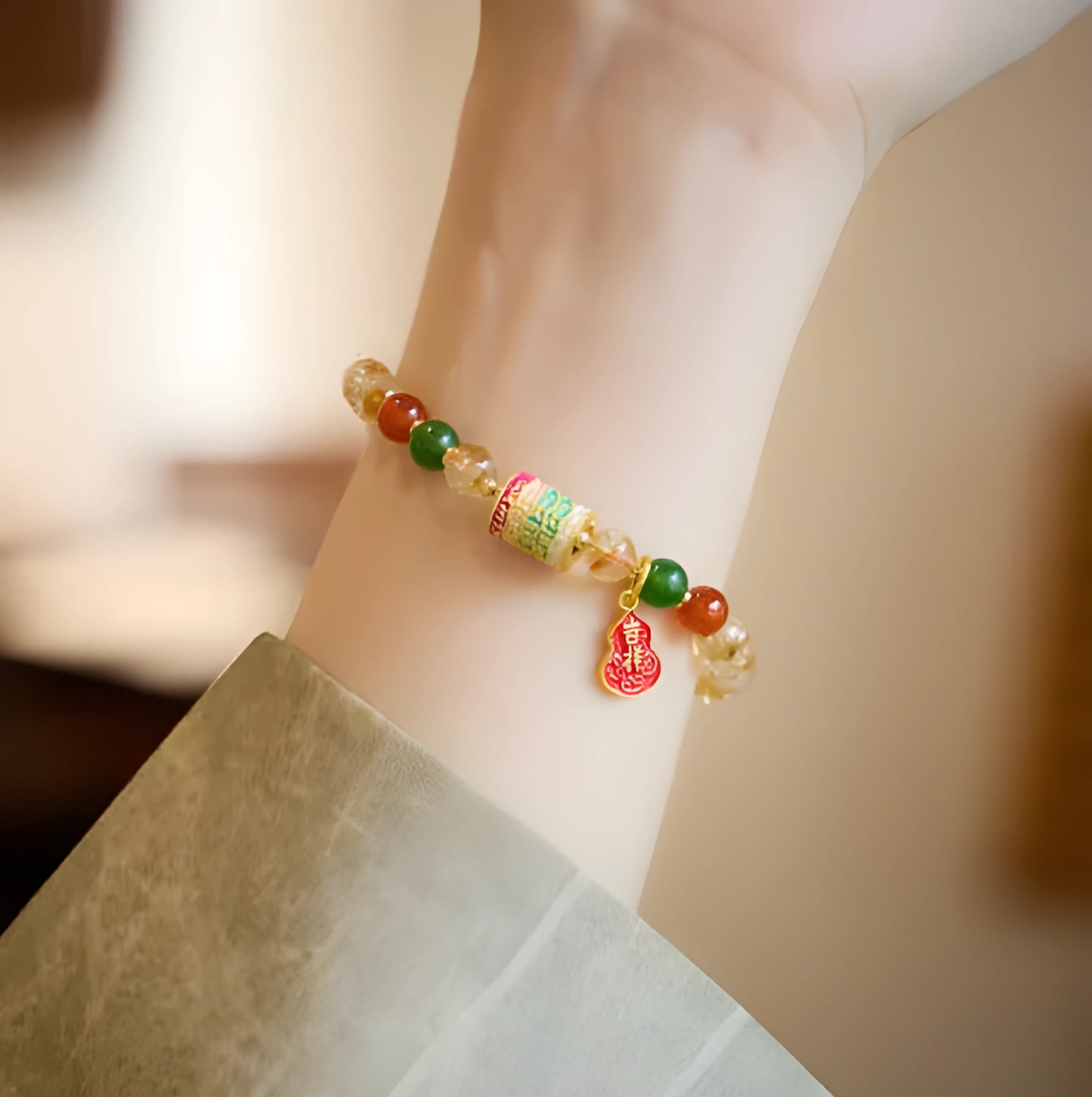 Hand-woven citrine crystal bracelet with 6mm geometric beads on a wrist