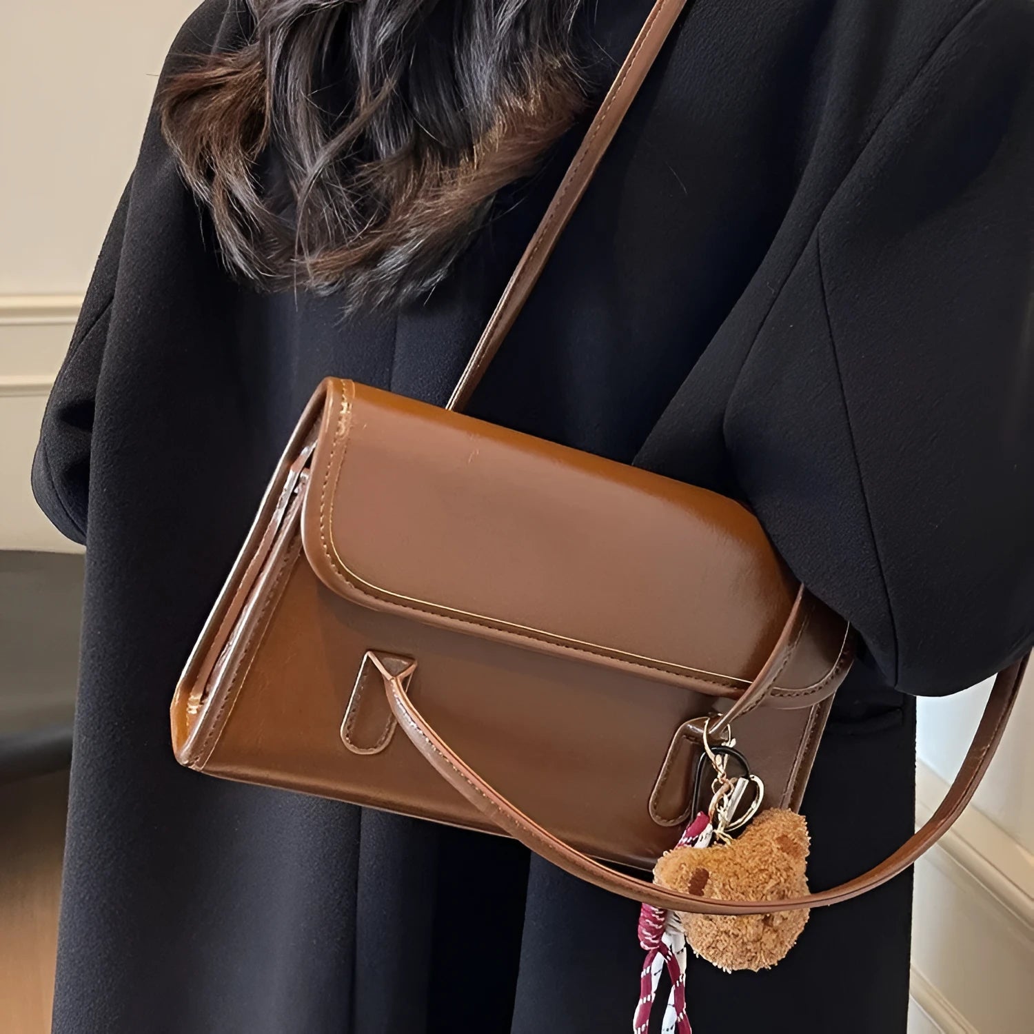 Women's brown PU Maillard shoulder bag with pendant showing horizontal square shape and dual straps