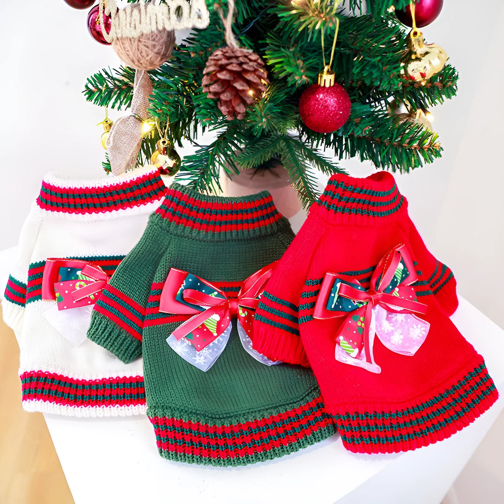 Red and green dog Christmas jumpers showing weight-based sizing from XS to XL for holiday pet wear