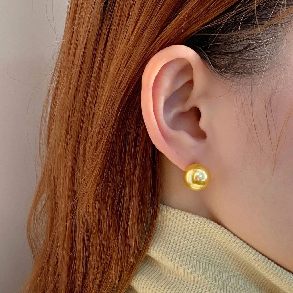Large pearl stud earrings with eight awn star geometric design in 925 sterling silver showing 8mm to 14mm size options