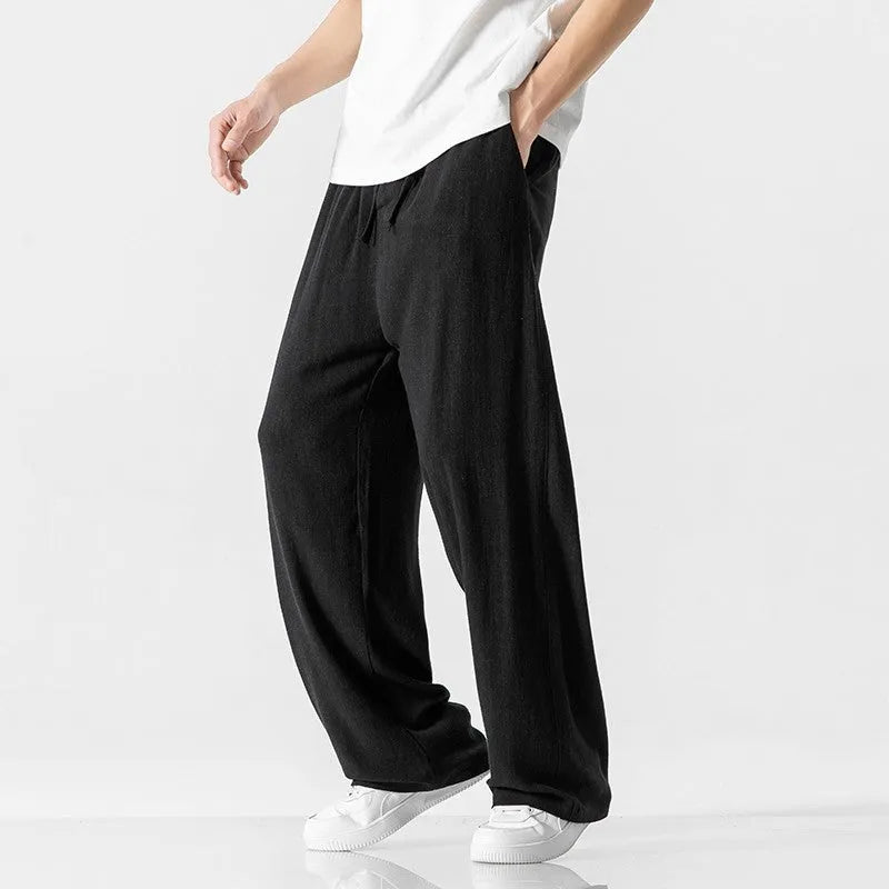 Men's linen trousers in straight-leg cut with cropped length and drawstring waist in beige colour