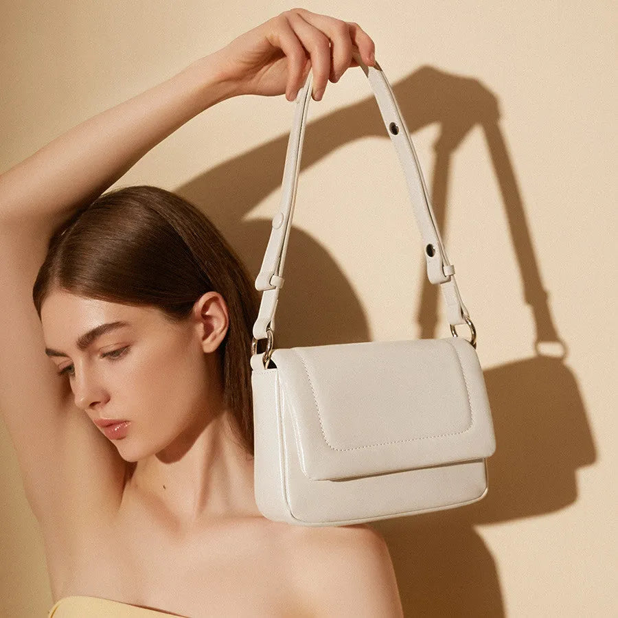 Genuine leather flap shoulder bag with soft two-layer cowhide in black, greyish white, or apricot.