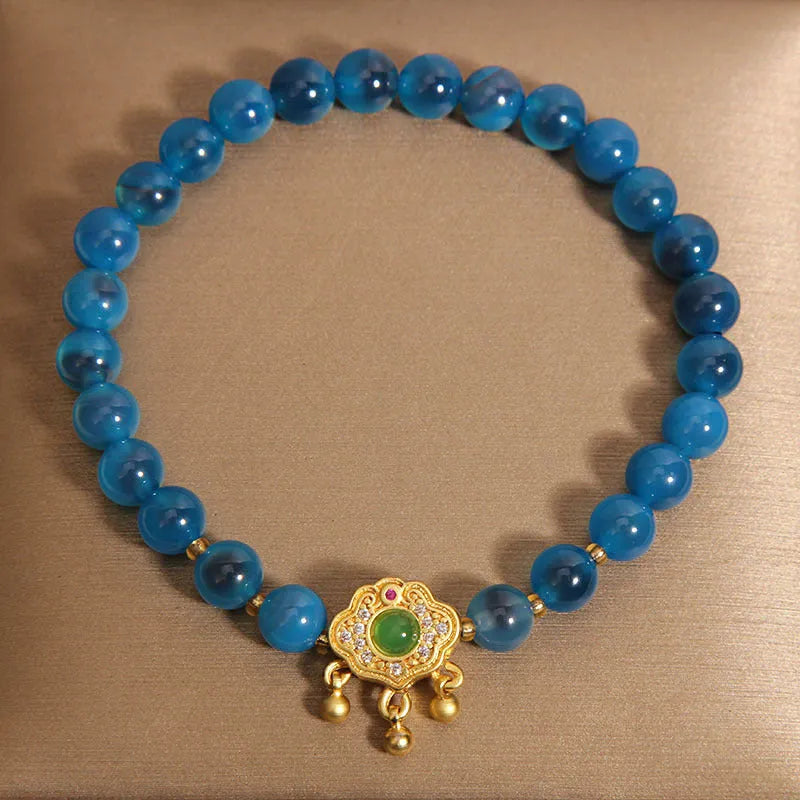 Blue sugar heart agate safety lock pendant bracelet for women with crystal construction and rhinestone detailing