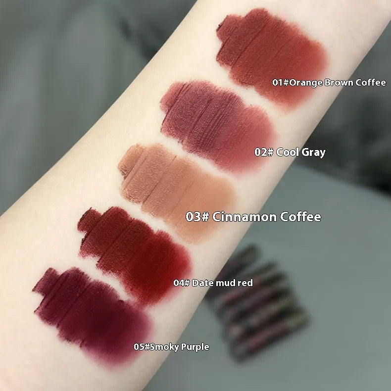 Lava Secret Matte Lip Mud Lipstick bullet in one of five colours: orange brown, cool gray, cinnamon, red, or purple.