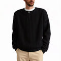Men's grey half zip textured knit sweater showing loose fit design and adjustable zip closure