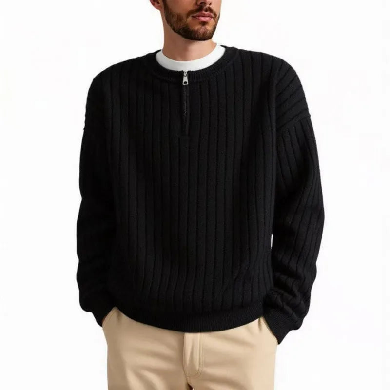 Men's grey half zip textured knit sweater showing loose fit design and adjustable zip closure