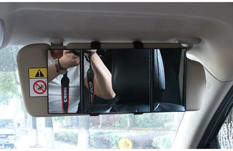 Silver car folding makeup mirror shown closed at 15.5cm wide and opened to 30.5cm wide