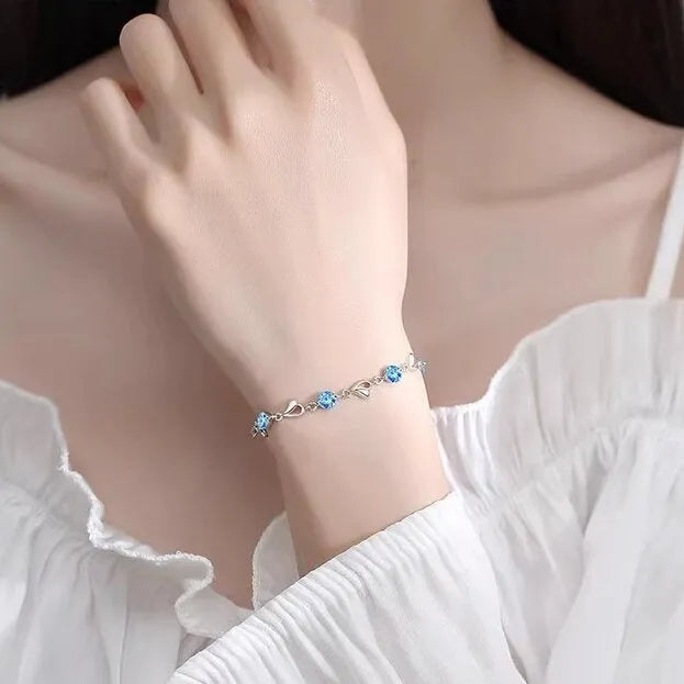 Blue diamond love heart necklace and bracelet jewellery set with mixed gem inlaid pendant