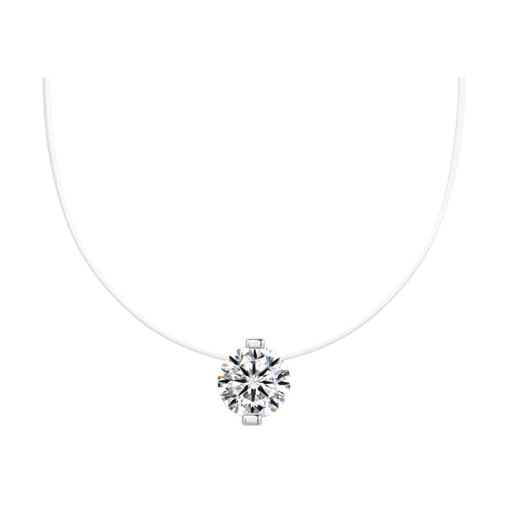 Women's silver pendant necklace with moissanite stone on an invisible fishing line chain.