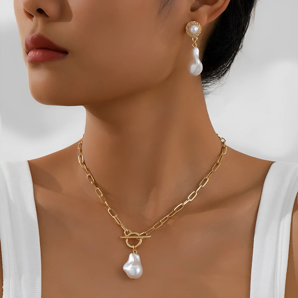 Gold tone retro baroque pearl jewellery set showing necklace and matching earrings