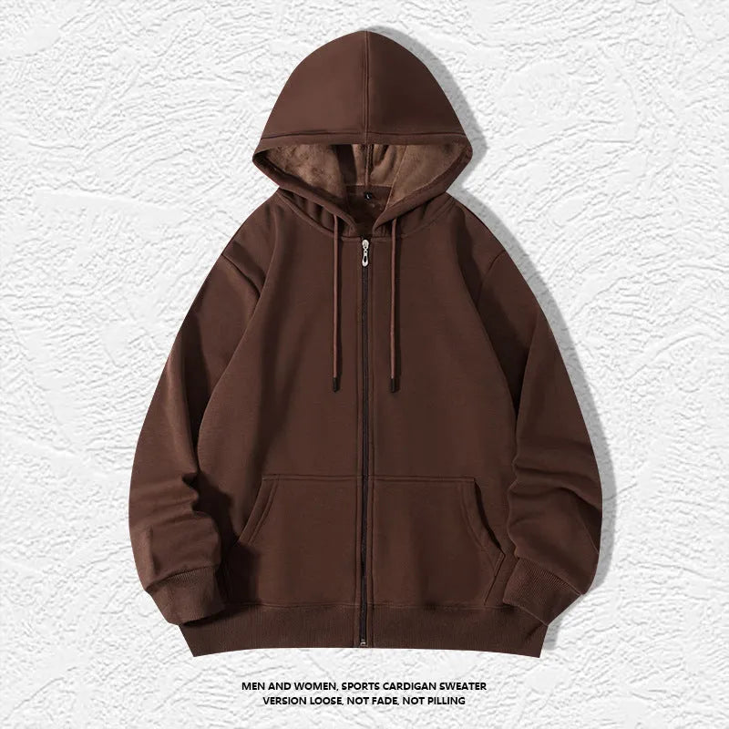 Plus size man wearing a beige zip-up hooded cardigan sweater with kangaroo pockets