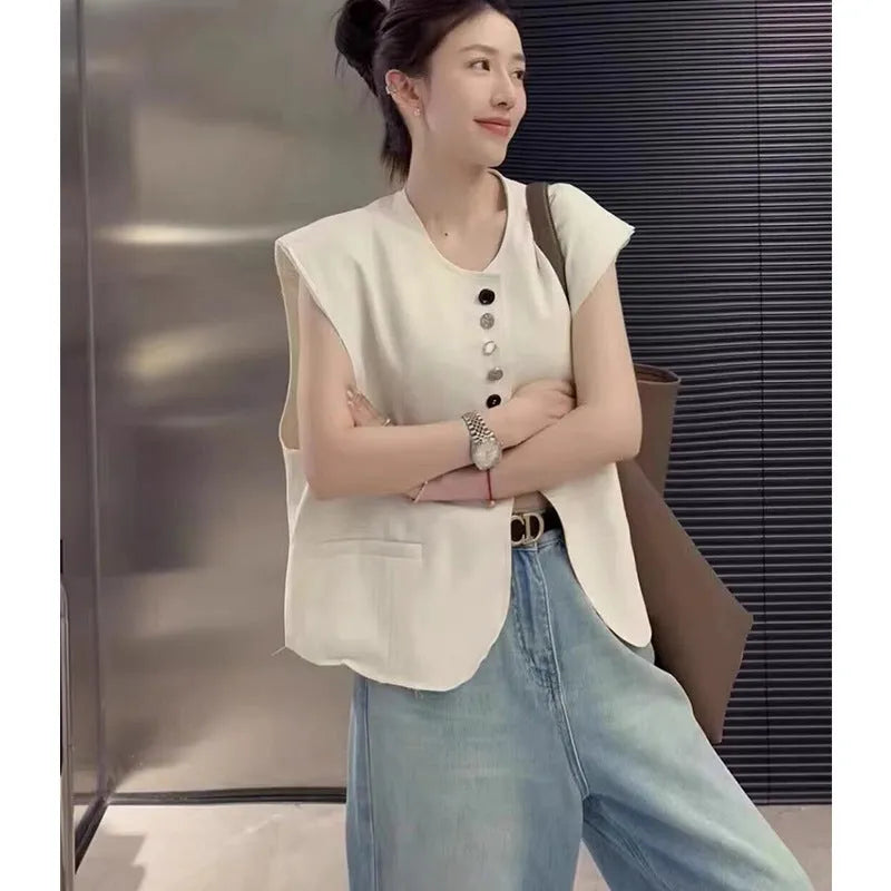 Women's loose-fit polyester vest with pockets in short 40cm length