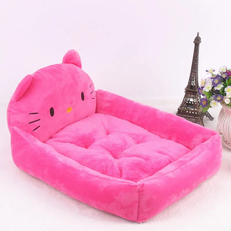 Cartoon print washable pet sofa bed for a small dog or cat, shown in blue, brown, gray, pink, or yellow.