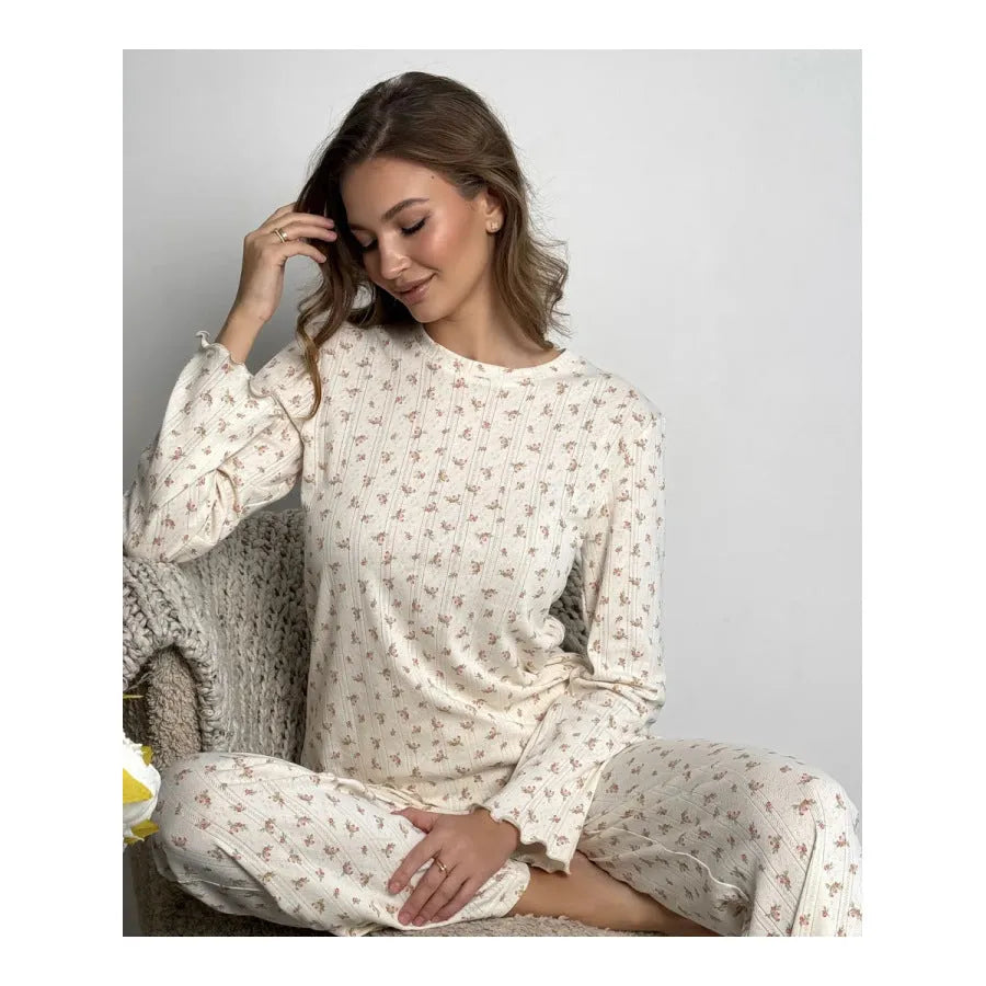 Women's white floral print bell sleeve top and matching wide leg trousers suit set