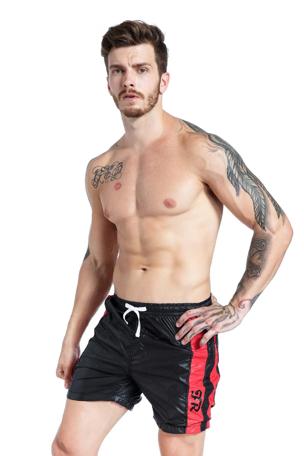 Men's blue lace-up sports shorts with slim fit and padding detail on a plain background.