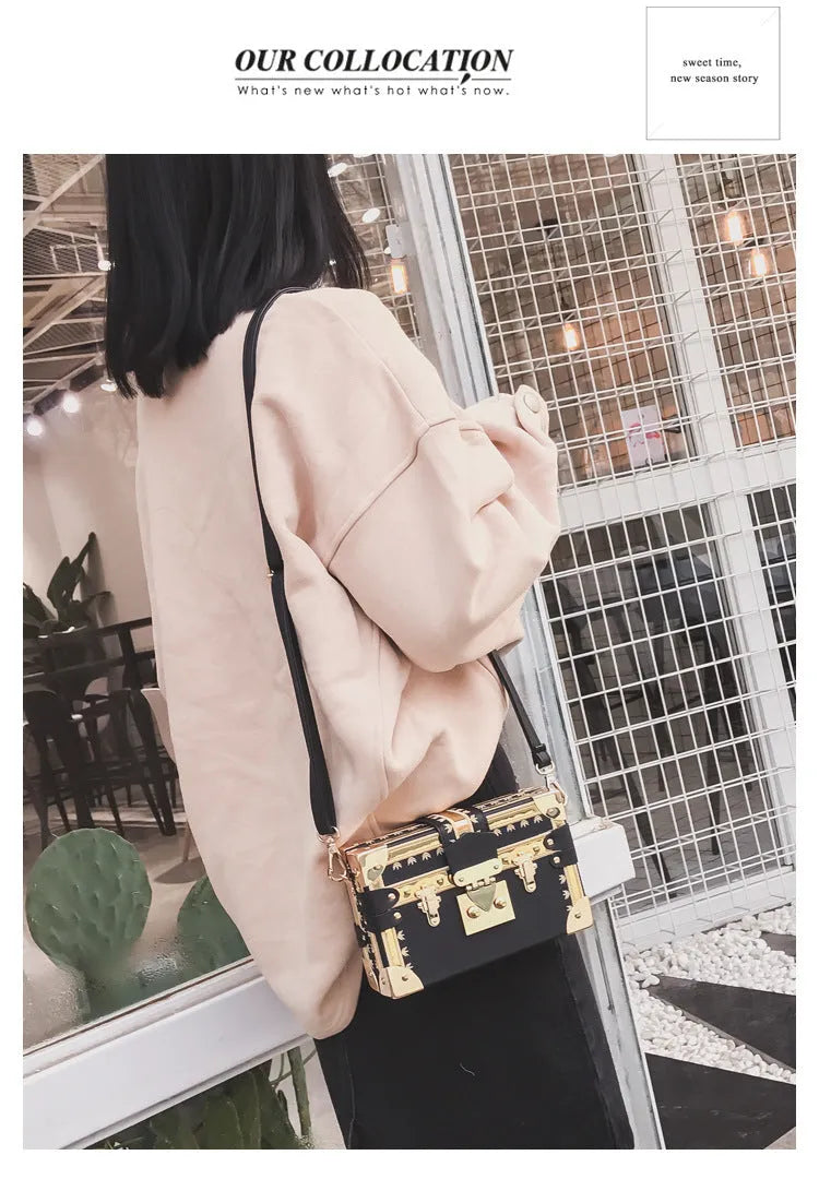 Black hard case PU leather women's shoulder bag with flap closure and cross-body strap