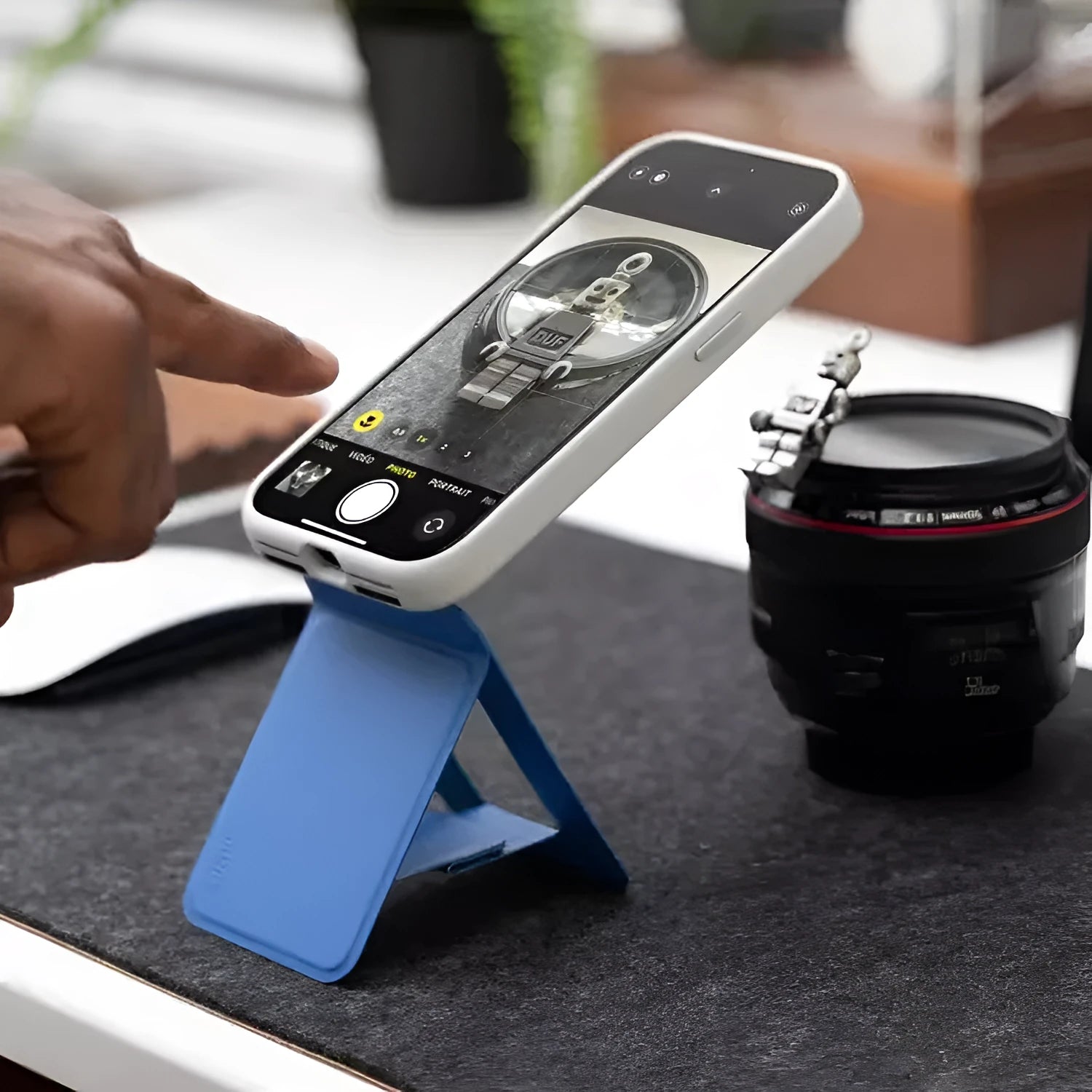 Black MOVAS leather magnetic phone holder case showing dimensions 96.5mm by 63.5mm.