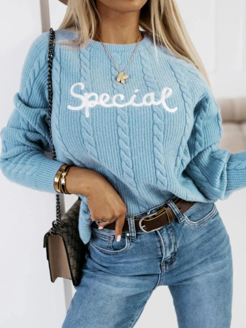 Blue pullover sweater with embroidered lettering crew neck design street fashion knitwear