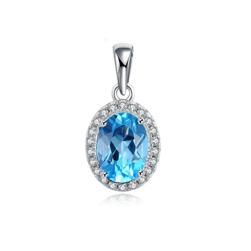925 sterling silver jewellery set with blue topaz gemstones showing earrings, ring, pendant and necklace