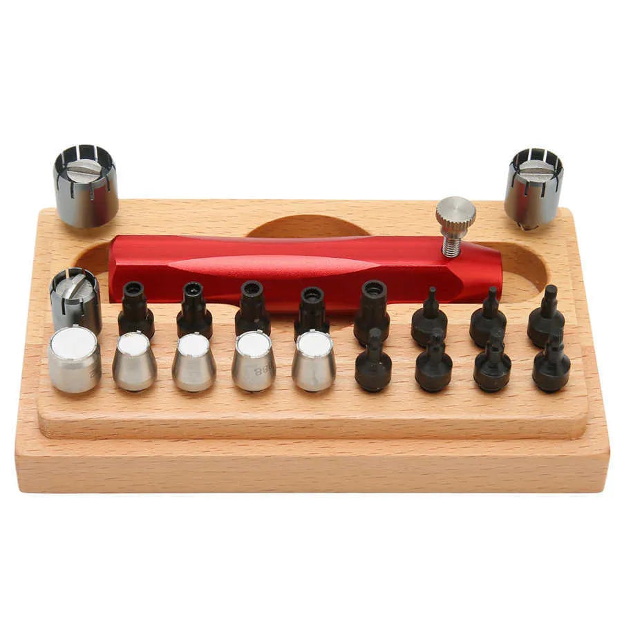 Set of 20 steel watch repair extracting tubes for opening watch cases on a repair mat.