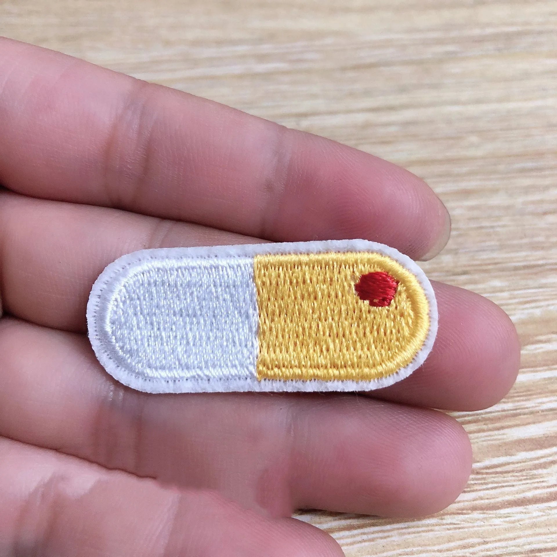 Computer embroidered fabric patch badges with lace craft design on white background