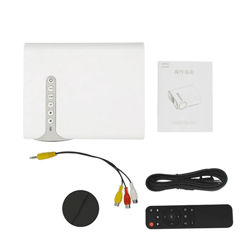 Black YG530 mini wireless mobile phone LED projector on a table, showing a large projected image.