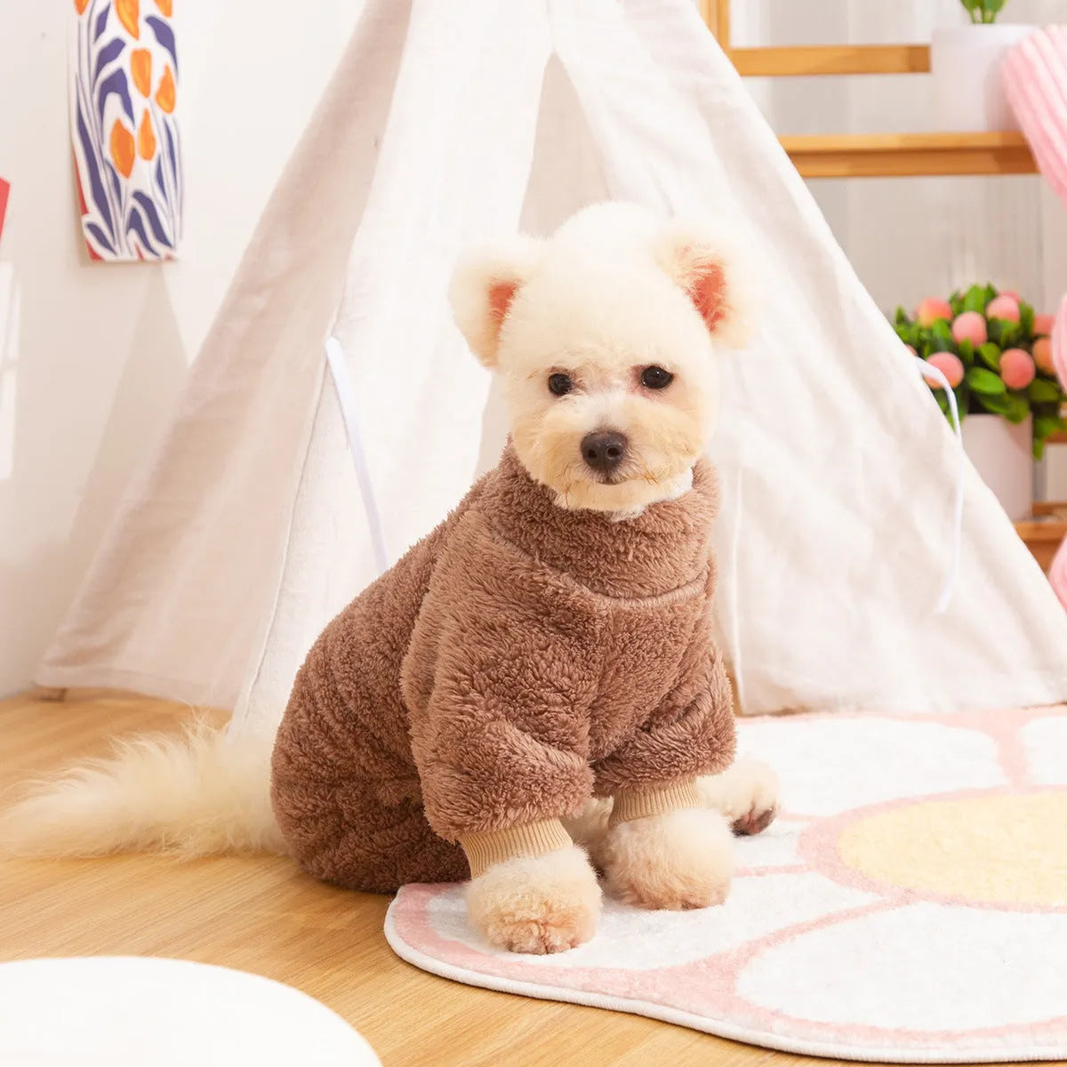 Blue double-sided plush dog clothes with high collar and towing ring on a mannequin.