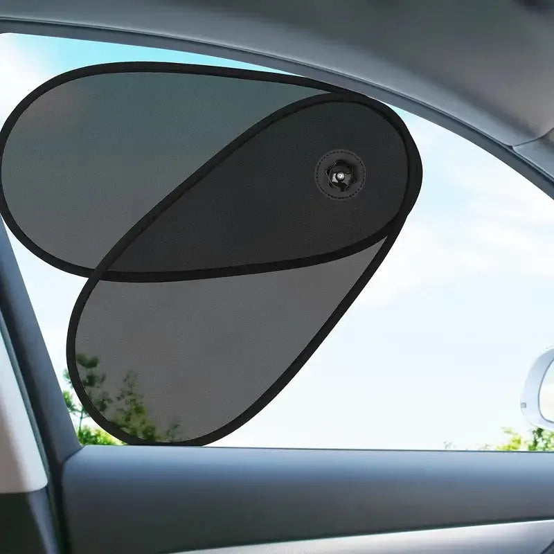 Black adjustable car window shade with suction cups mounted on vehicle side window