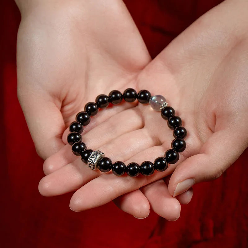 Obsidian bracelet with carved Chinese zodiac animal design, ethnic style, 8mm thick.