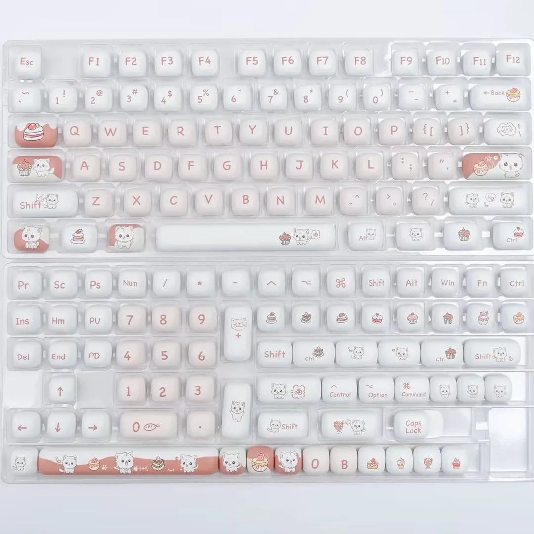 Cartoon dessert cat design on a round MOG profile mechanical keyboard key cap.