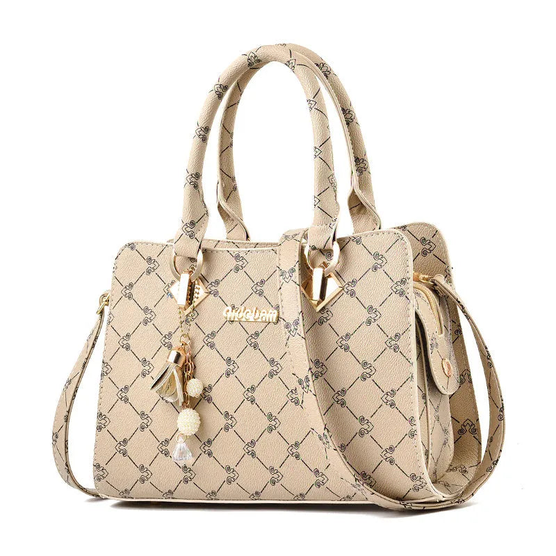 Women's geometric print messenger bag in PU material with zipper closure and internal organisation compartments
