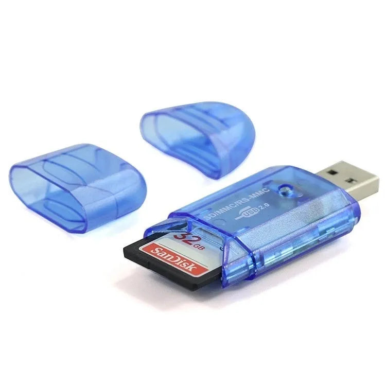 Transparent plastic USB card reader with LED illumination on a desk.