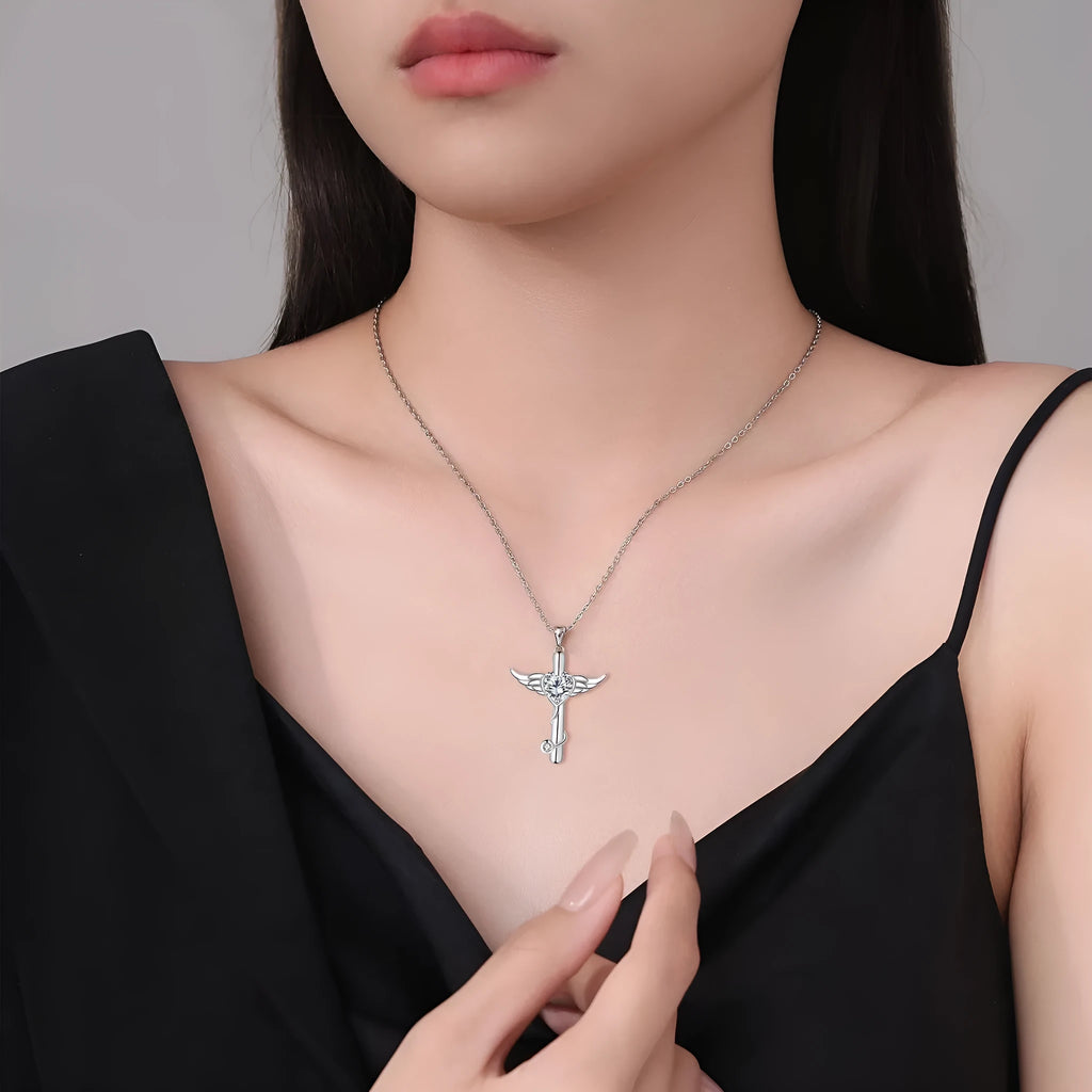 Copper electroplated necklace with a stethoscope-shaped pendant featuring a winged cross design.