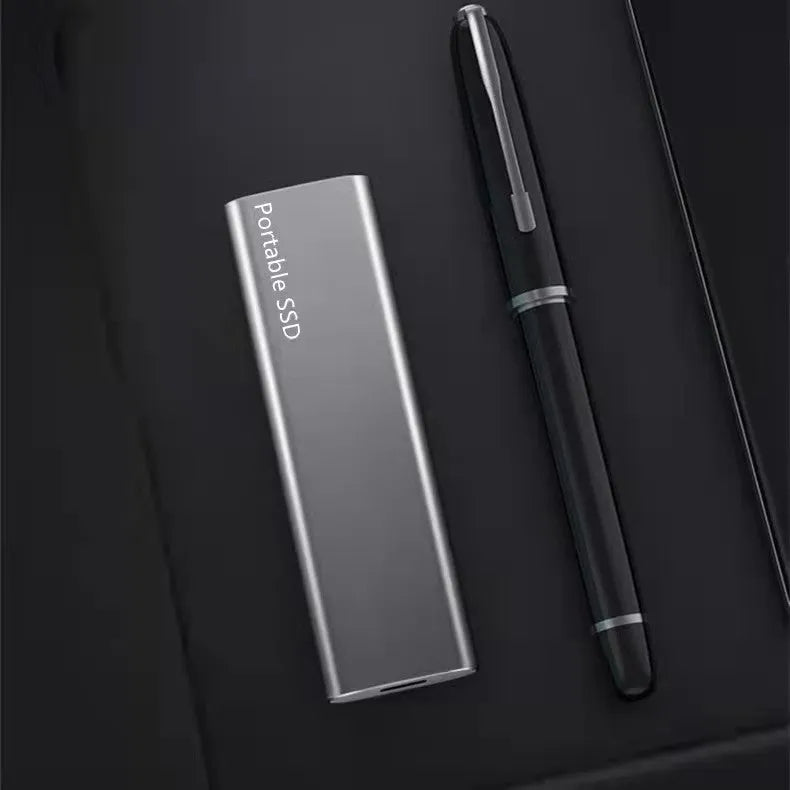 Ultra-thin metal external SSD portable hard drive in red, showing high-capacity storage for data transfer.