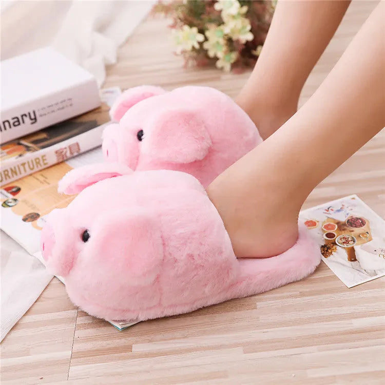 Pink pig design floor slippers made from short plush with PP cotton filling.