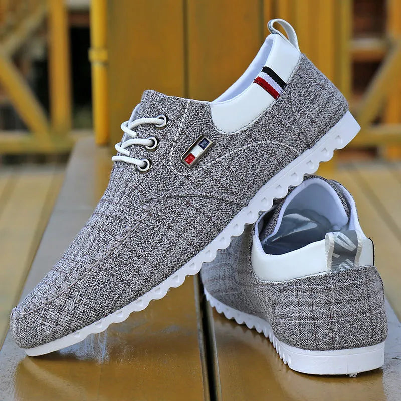 Hemp upper autumn sailing shoes in black with car suture pattern and shallow mouth