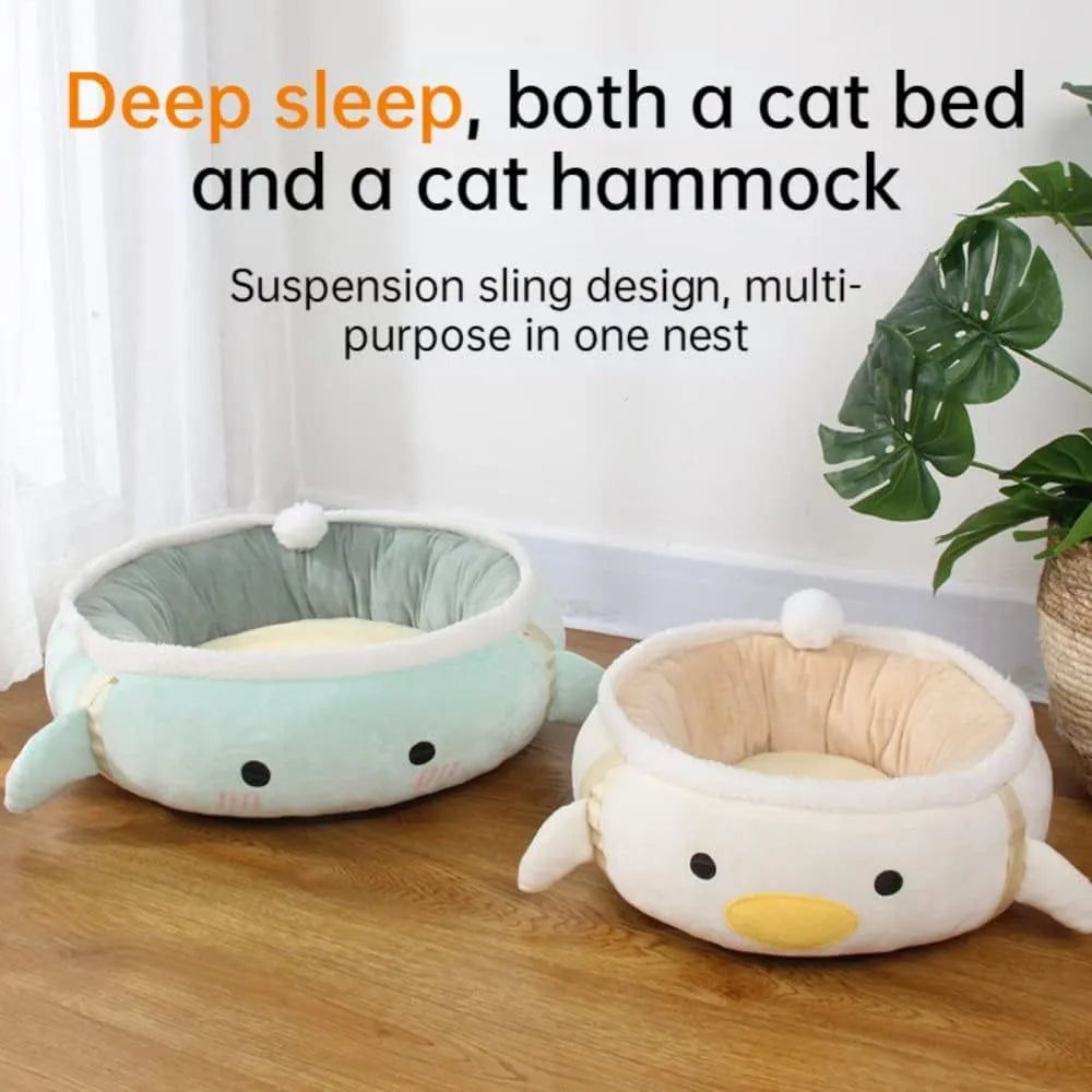 Green chick dinosaur shaped cat bed that can be used flat or hung as a hammock