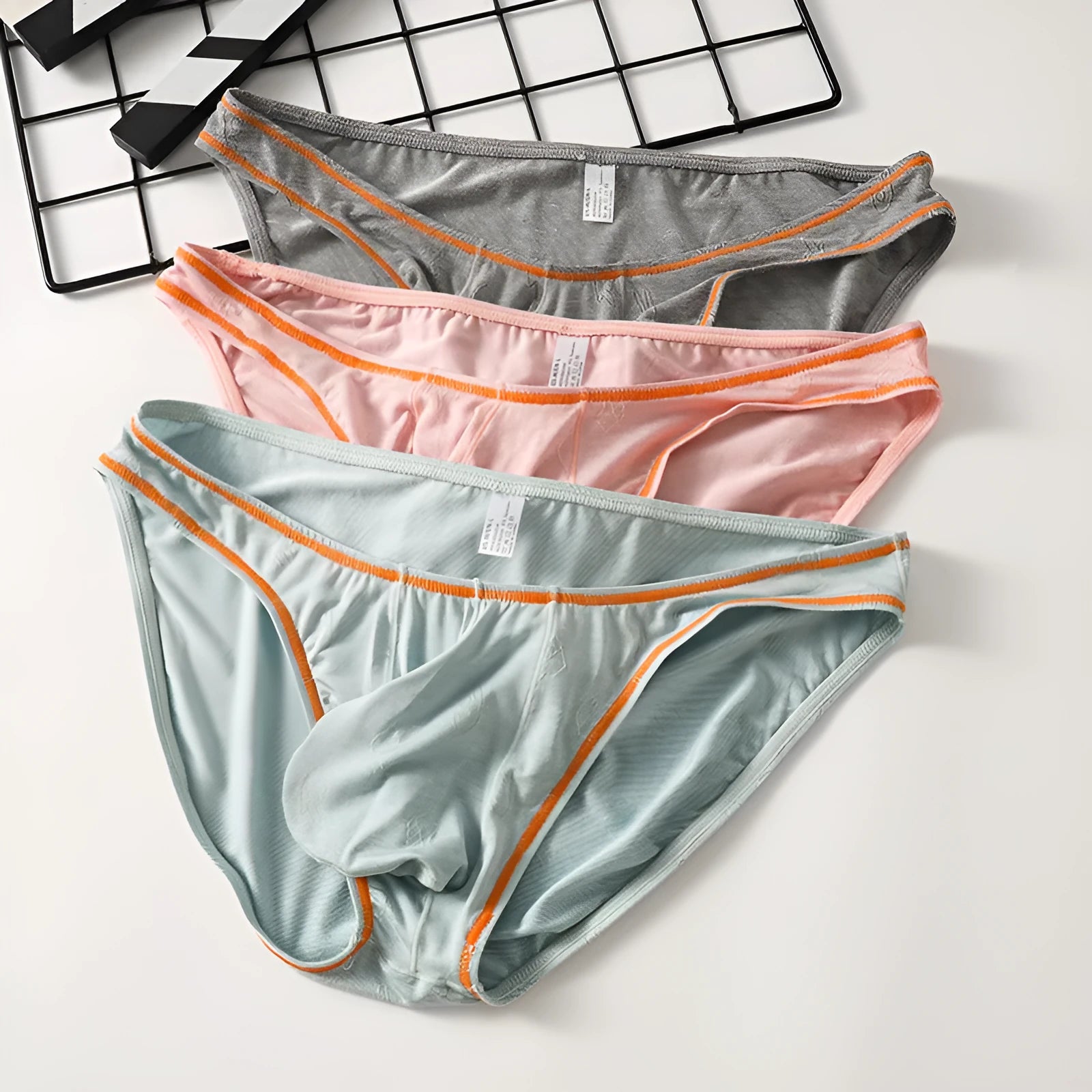 Men's Modal ice silk underwear in dark gray colour, showing knitted fabric and supportive design.